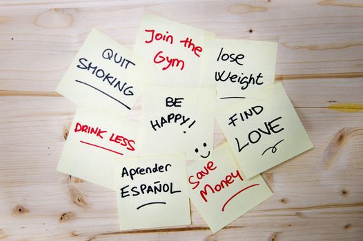 Group of New year Resolutions written on Post it Notes 