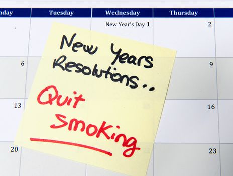New Years Resolution quit smoking post it note on calendar