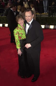 Kevin Spacey and date at the 6th Annual Screen Actors Guild Awards, Shrine Auditorium, 03-12-00