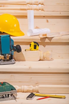 set of working tools on seteps of wooden ladder