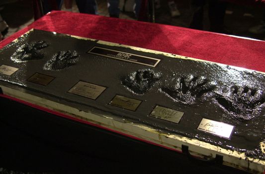 Cliff Williams, Brian Johnson, Angus Young, Malcolm Young at the ceremony where they were inducted into Sunset Blvd's Rockwalk. 09-15-00