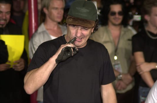 Brian Johnson at the ceremony where they were inducted into Sunset Blvd's Rockwalk. 09-15-00
