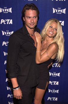 Pam Anderson and Marcus Schenkenberg at the PETA's 20th anniversary bash in Los Angeles. 09-13-00