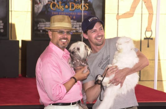 SEAN HAYES and JOE PANTOLIANO at a paw-print ceremony for Warner Brother's "Cats & Dogs" at the Egyptian Theater, Hollywood, 06-20-01