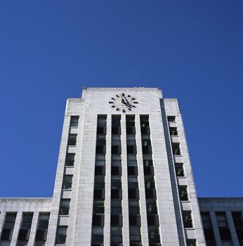 Large concrete building with blue sky