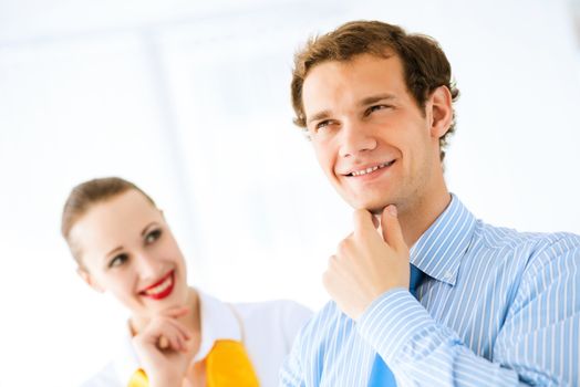 Businessman receiving congratulations from his colleagues in the leadership team work