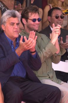 Jay Leno and Jim Carrey at the handprint/footprint ceremony for Nicolas Cage at the Chinese Theater, Hollywood, 08-14-01