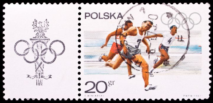 Poland- Circa 1967: Poland stamp dedicated to men's 100-meter race, from series "Sport and Olympic rings", circa 1967.