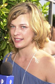 MILLA JOVOVICH at the celebrity recording of "We Are Family" to benefit the victims of New York's 9-11 tragedy, 09-23-01