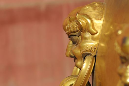 Golden dragon handle from Forbidden City in Beijing.