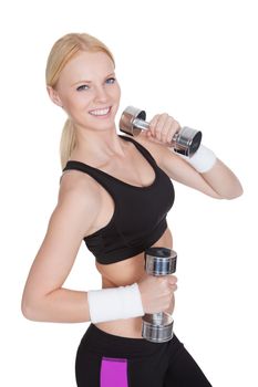 Beautiful young fitness woman doing weight training. Isolated on white