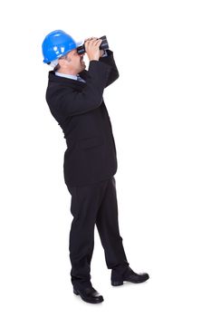 Male Architect Looking Through Binoculars On White Background