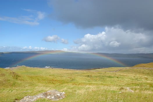 Rainbow over the sea near Dunvegan Skye