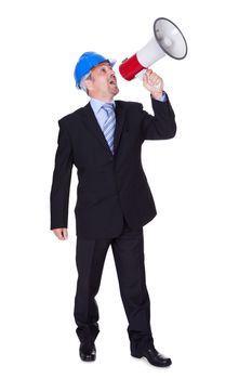 Male Architect Shouting In Megaphone On White Background