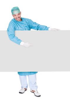 Doctor In Operation Gown Holding Blank Placard On White Background