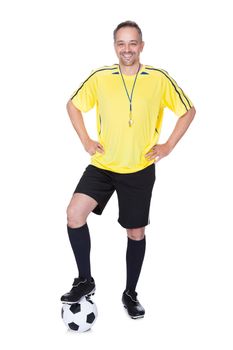 Portrait Of A Happy Soccer Player With A Football Against White Background