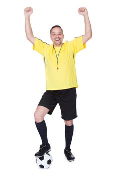 Portrait Of A Happy Soccer Player With A Football Against White Background