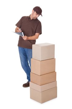 Delivery Man Counting Boxes Isolated On White Background