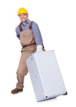 Man With Back Pain Lifting Metal Box Isolated On White Background