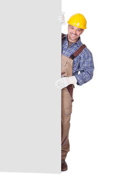 Portrait Of Happy Contractor Holding Placard On White Background