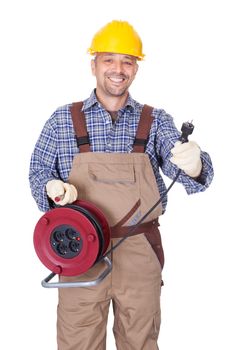 Happy Electrician Holding Wire Plug On White Background