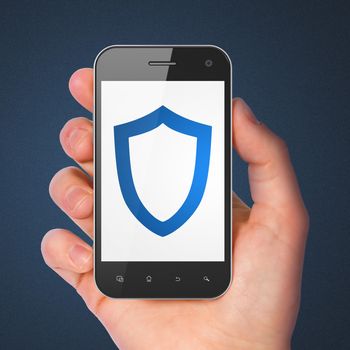 Safety concept: hand holding smartphone with Contoured Shield on display. Mobile smart phone on Blue background, 3d render