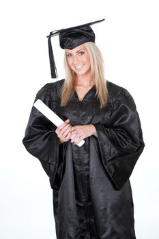 Beautiful female student graduating. Isolated on white