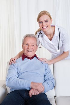 Portrait Of Happy Doctor And Patient; Indoor