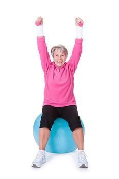 Senior Woman Exercising With Dumbbells On White Background