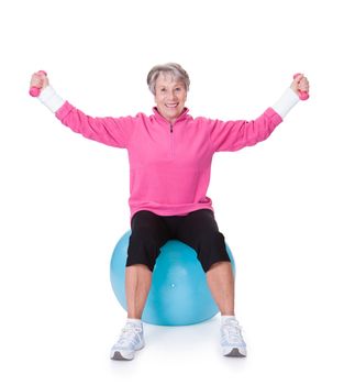 Senior Woman Exercising With Dumbbells On White Background