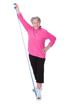 Senior Woman Stretching Exercising Equipment On White Background