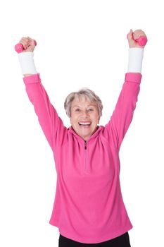 Portrait Of A Senior Woman Exercising On White Background
