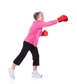 Portrait Of Senior Female Boxer Isolated On White Background