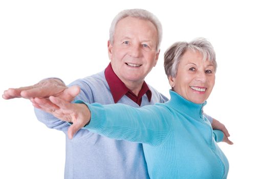 Portrait Of Happy Senior Couple Isolated Over White Background