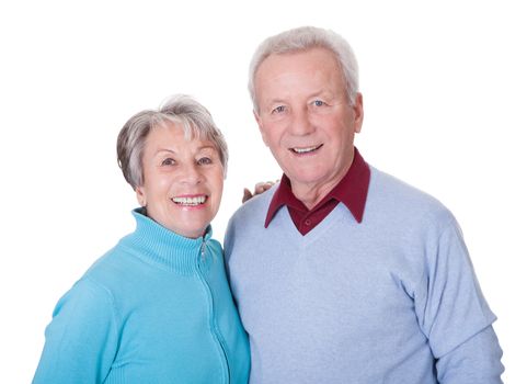 Portrait Of Happy Senior Couple Isolated Over White Background