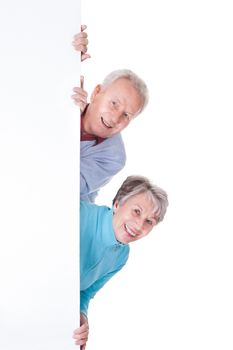 Happy Senior Couple Holding Blank Placard On White Background