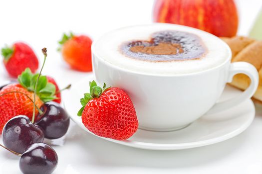 cappuccino in a cup in the shape of hearts,cherry,croissant  and strawberries isolated on white