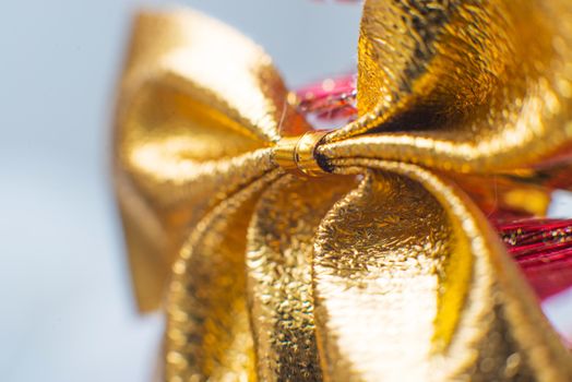 Gold Christmas bow close up