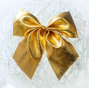 Gold Christmas bow close up