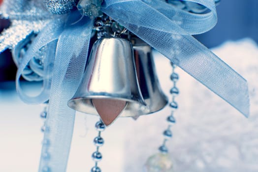 Christmas bells with ribbons in blue tone