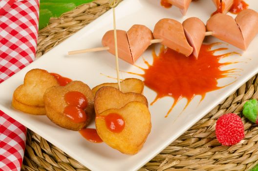 Sausages and  chips in  heart shape, Valentines day fast food