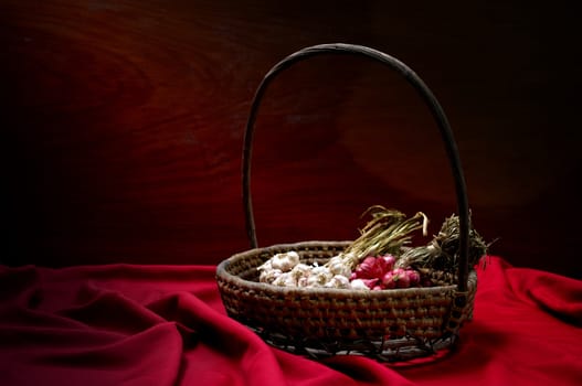 Shallots and Garlic in basket, Still life