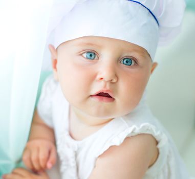 cute baby in chef's hat