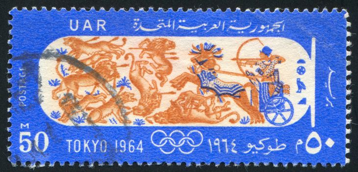 EGYPT - CIRCA 1964: stamp printed by Egypt, shows Animals, chariot rider, Olympic emblem, circa 1964
