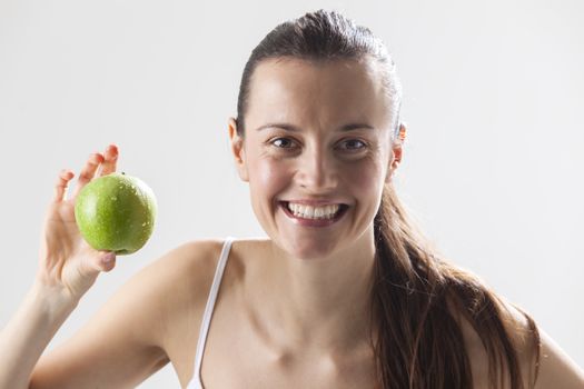 young woman with an apple