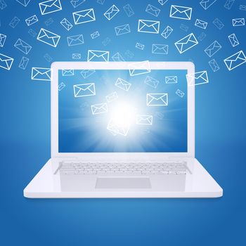 Emails fly out of laptop screen. The concept of e-mailing