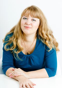 portrait of a young blonde woman with overweight