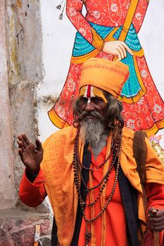 Indian man walking in the street of Udaipur, Rajasthan, India