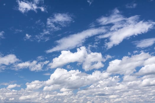 Blue summer sky with white clouds