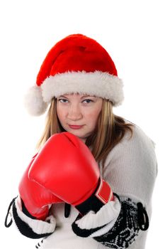 Young women in santa's hat with boxing gloves